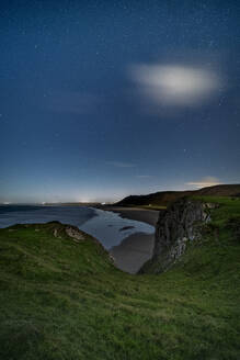 Worms Head and Rhossili beach under moonlight, Gower, South Wales, United Kingdom, Europe - RHPLF29785