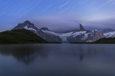 Star trail over Bachalpsee and the Bernese Oberland mountains, Grindelwald, Bern Canton, Switzerland, Europe - RHPLF29840