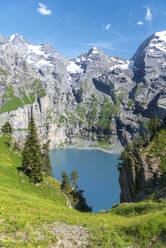 Elevated view of the crystal clear water of Oeschinensee lake, Oeschinensee, Kandersteg, Bern Canton, Switzerland, Europe - RHPLF29844