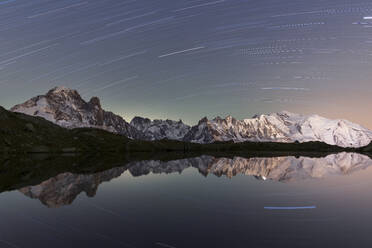 Star trail over Mont Blanc range seen from Lac de Cheserys, Chamonix, French Alps, Haute Savoie, France, Europe - RHPLF29866