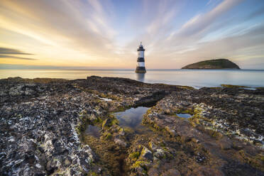 Trwyn Du Lighthouse at sunset in summer, Beaumaris, Wales, Great Britain, United Kingdom, Europe - RHPLF29872