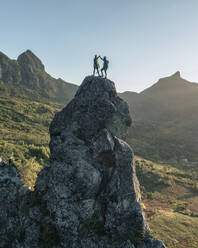 Aerial view of people climbing on Piton Jacob Peak mountain in Port Louis, Mauritius. - AAEF24618