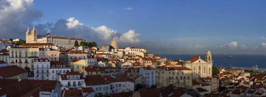 Portugal, Lisbon District, Lisbon, Panoramic view of Alfama district at dusk - ABOF00940