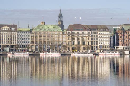 Germany, Hamburg, Apartments reflecting in Binnenalster Lake - KEBF02770