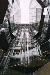 Modern glass building under sky - MMPF01054