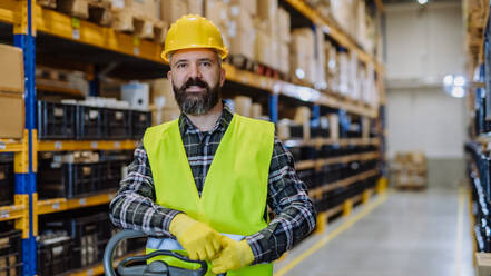 Portrait of a warehouse worker or a supervisor. - HPIF31158