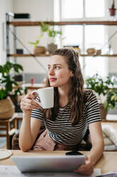 Young woman working in coworking office. - HPIF31260