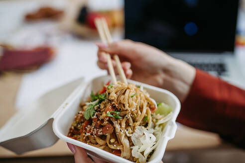 Close up of chinese food, lunch time in the office. - HPIF31311