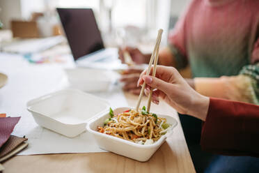 Close up of chinese food, lunch time in the office. - HPIF31315