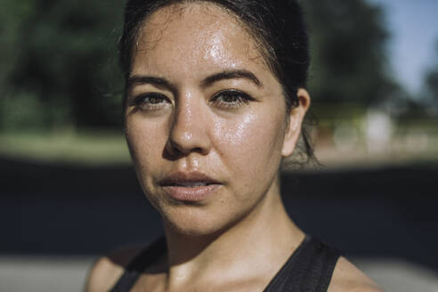 Portrait of confident woman exercising on sunny day - MASF40973