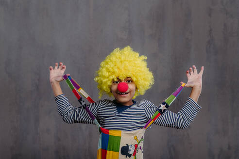 Portrait of little boy in clown costume, studio shoot. - HPIF32073