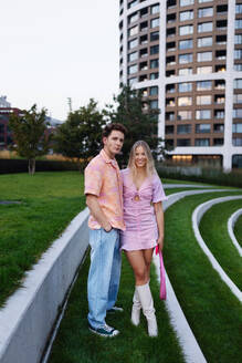 Young couple heading for a romantic dinner in the city. Dating apps popularity among Gen Z. - HPIF32310