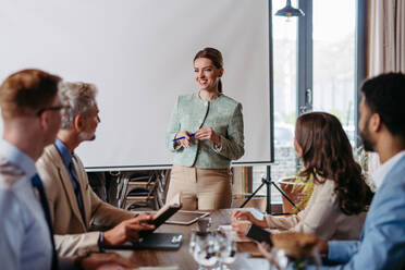 Young colleagues having meeting in an office. - HPIF32328