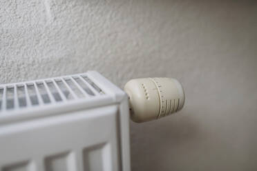 Radiator with regulator near white wall - HAPF03534