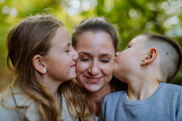 Portrait of happy family with her children in the nature. - HPIF32750