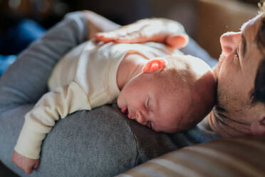 Close-up of father holding his little new born baby. - HPIF33104