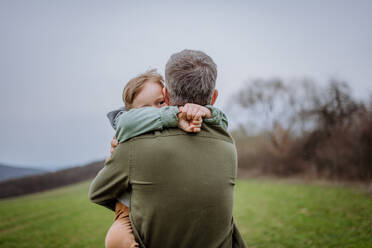 Father and his little son on a walk in the nature. - HPIF33223