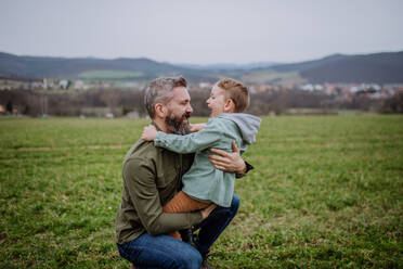 Father and his little son on a walk in the nature. - HPIF33290