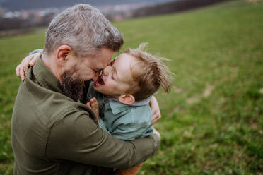 Father and his little son on a walk in the nature. - HPIF33291