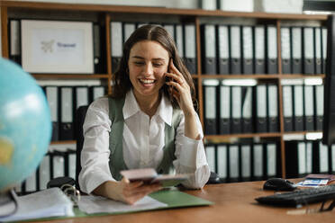 Young businesswoman working and calling in the office. - HPIF34045