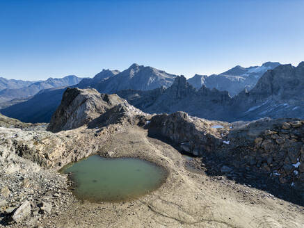 Italy, Small mountaintop pond in Western Alps - LAF02835