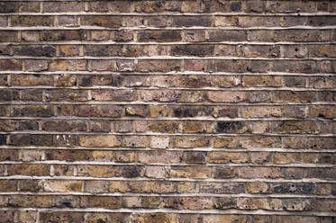 Fragment of an old brick wall background. - HPIF35897