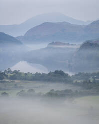 Dawn mist and mountain reflections in Llyn Gwynant, Snowdonia National Park, Wales, United Kingdom, Europe - RHPLF30170