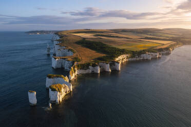 Aerial view of Old Harry Rocks at sunset, Handfast Point, Purbeck, Jurassic Coast, UNESCO World Heritage Site, Dorset, England, United Kingdom, Europe - RHPLF30294