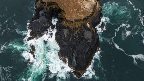 Aerial of the wild coastline with basalt pools on the Atlantic coastline, Dombe Grande, Namibre, Angola, Africa - RHPLF30445