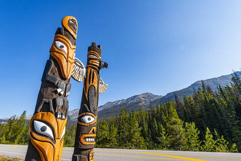 Totem poles along the Glacier Parkway, Alberta, Canada, North America - RHPLF30791