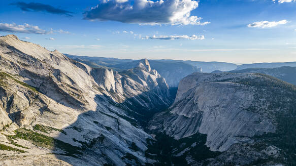 Granite mountains with Half Dome in the background, Yosemite National Park, UNESCO World Heritage Site, California, United States of America, North America - RHPLF30909