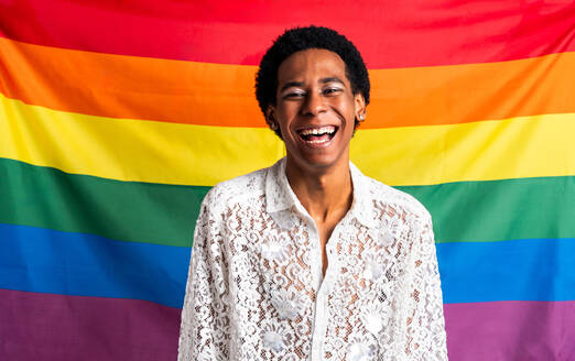 Fluid gender hispanic latin black man posing in studio with fashionable clothing, concepts about LGBTQ, genderless and diversity - DMDF08094