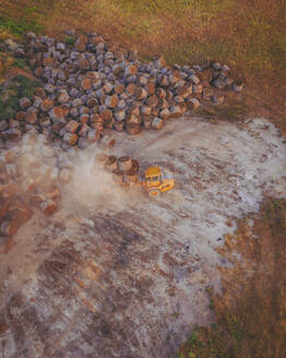 Aerial view of a Lavender Machinery at sunrise, near Valensole, Provence, France. - AAEF24730