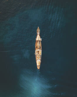 Aerial view of a sailboat near Port Andratx, Mallorca, Baleares, Spain. - AAEF24941