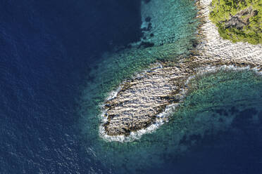 Aerial view of the fish shape rocky coast on Island Vrhovnjak, Korcula, Croatia. - AAEF25126