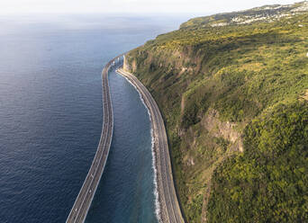 Aerial view of the new and old coastal road Route du Littoral connecting Saint Denis with La Possession, Réunion. - AAEF25133