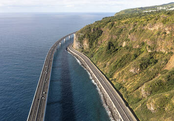 Aerial view of the new and old coastal road Route du Littoral connecting Saint Denis with La Possession, Réunion. - AAEF25139