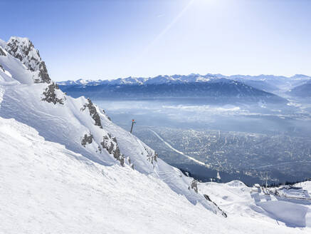 Austria, Tyrol, View from snowcapped peak of Hafelekarspitze - MMAF01507