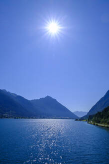 Austria, Tyrol, Pertisau, Summer sun shining over Achensee lake - LBF03868