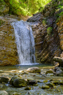 Germany, Bavaria, Unterammergau, Small waterfall in Schleifmuhlenklamm canyon - LBF03880