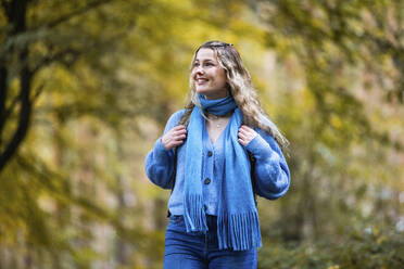 Happy beautiful woman in forest - WPEF08077