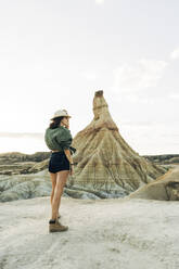 Tourist standing near Castildetierra under sky - DAMF01230