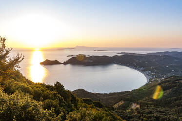 Greece, Ionian Islands, Sunset over Agios Georgios Pagon bay - EGBF01013