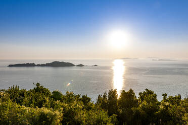 Greece, Ionian Islands, Sun setting over Nisida Kravi island - EGBF01037