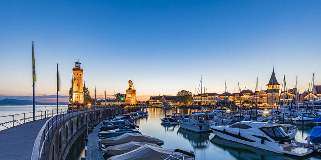 Germany, Bavaria, Lindau, Harbor on lake Bodensee at dusk - WDF07517