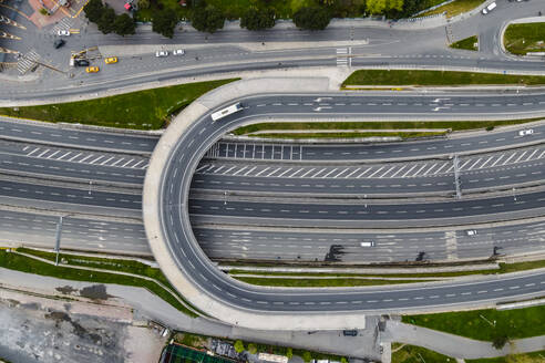 Aerial view of vehicles driving a complex highway in Istanbul, Turkey. - AAEF25494