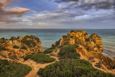 Portugal, Algarve, Lagos, Clouds over cliffs on Atlantic coast - ABOF00943