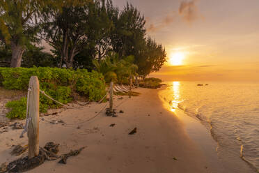 View of beach and Indian Ocean at sunset in Cap Malheureux, Mauritius, Indian Ocean, Africa - RHPLF31638