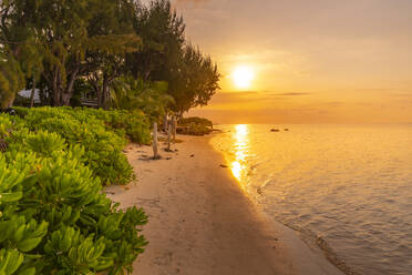 View of beach and Indian Ocean at sunset in Cap Malheureux, Mauritius, Indian Ocean, Africa - RHPLF31643