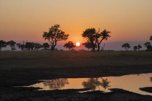 Sunset over the Okavango Delta, Botswana, Africa - RHPLF31722